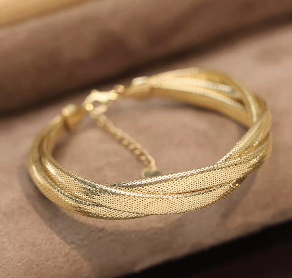 K18 蛇 ブレスレット バングル スネーク 18K YG イエローゴールド K18YG ツイスト 太め ゴツい ボリューム ねじり 編み 弾力ブレスレット - Jewelry Hills Tokyo