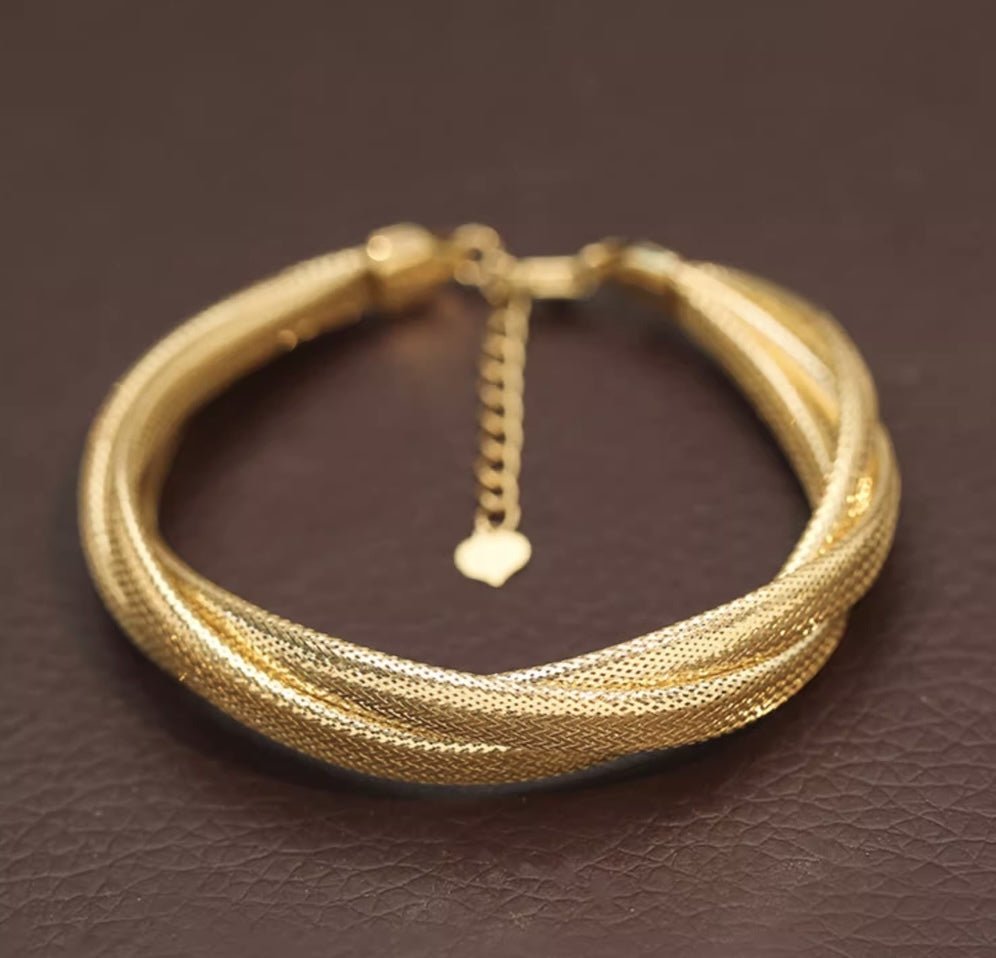 K18 蛇 ブレスレット バングル スネーク 18K YG イエローゴールド K18YG ツイスト 太め ゴツい ボリューム ねじり 編み 弾力ブレスレット - Jewelry Hills Tokyo