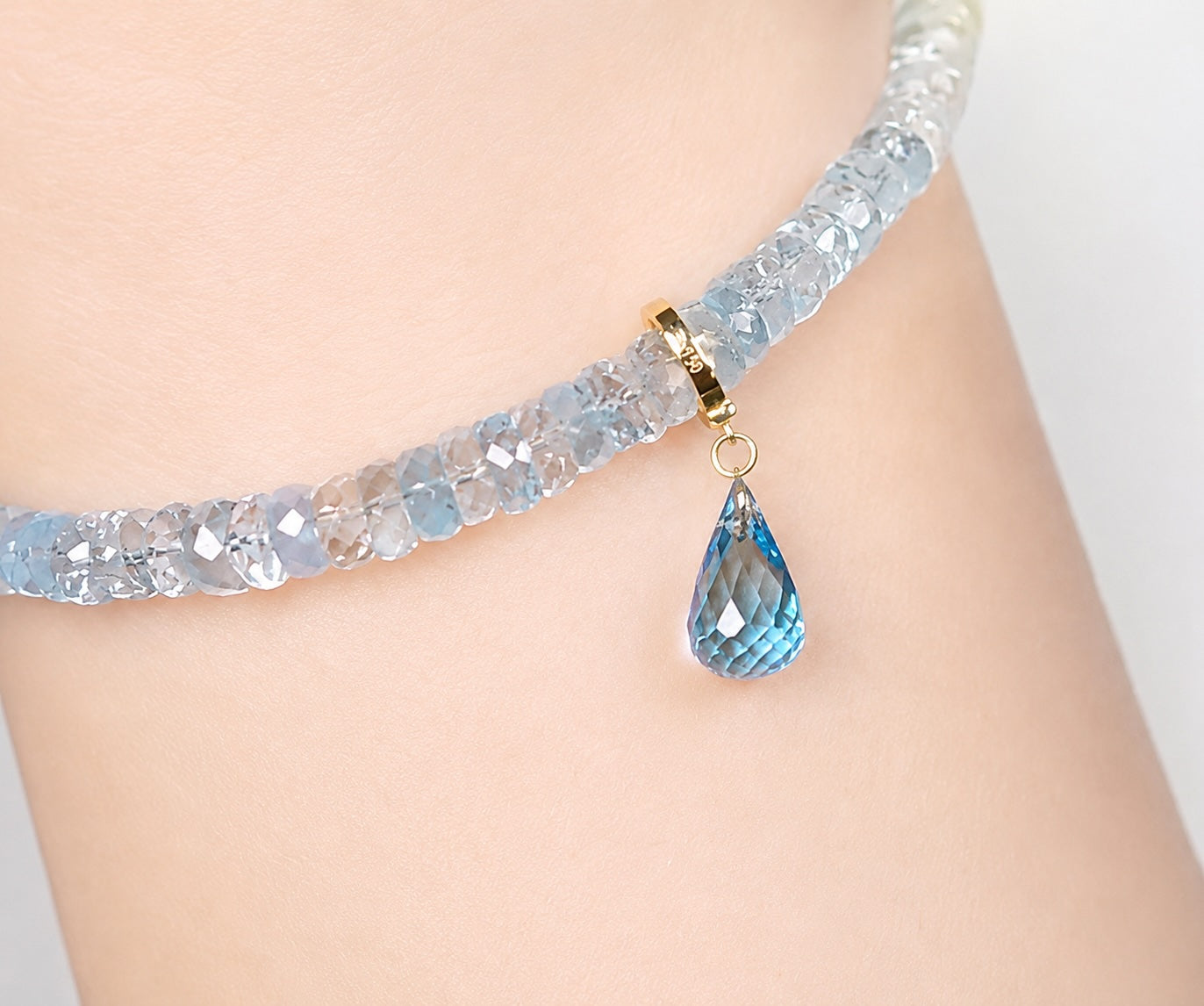 K18YG ブルートパーズ ティアドロップ ファセットカット チャーム 雫 18k ペンダント引き輪 クラスプチャーム ペアシェイプ