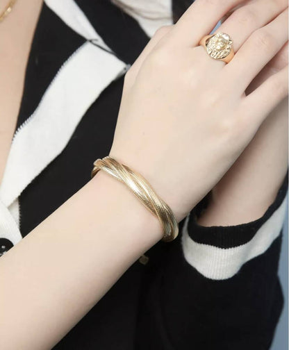 K18 蛇 ブレスレット バングル スネーク 18K YG イエローゴールド K18YG ツイスト 太め ゴツい ボリューム ねじり 編み 弾力ブレスレット - Jewelry Hills Tokyo