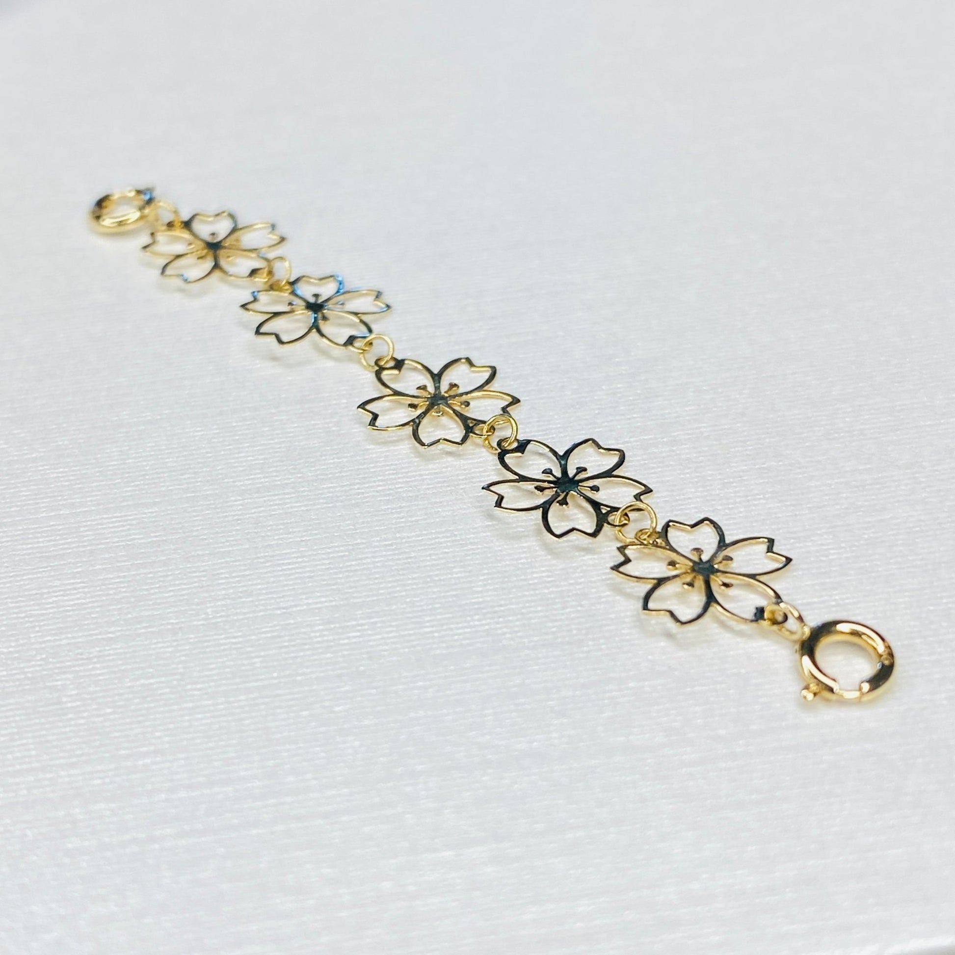 K18YG 引き輪 ヒキワ ひきわ 花 桜 梅 チェーンパーツ ネックレスパーツ YG 18K チャーム 両開口 コマ 花モチーフ 1.8cm / 3.8cm / 5.8cm 延伸 延ばす - Jewelry Hills Tokyo